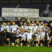 Kyle Steyn lifts the 1872 cup after Glasgow Warriors' big win over Edinburgh.