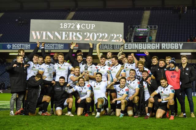 Kyle Steyn lifts the 1872 cup after Glasgow Warriors' big win over Edinburgh.