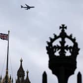 A British flag waves atop of Houses of Parliament. Picture: AP Photo/Thanassis Stavrakis