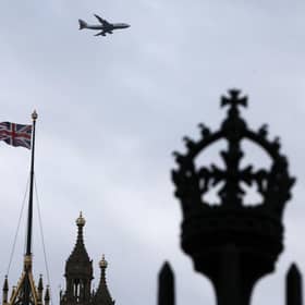A British flag waves atop of Houses of Parliament. Picture: AP Photo/Thanassis Stavrakis