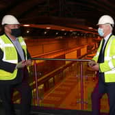 UK government minister for Scotland David Duguid and Drax Group’s Ian Kinnaird with Cruachan Power Station’s generating units behind them.