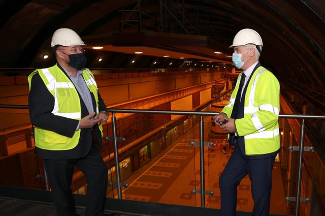 UK government minister for Scotland David Duguid and Drax Group’s Ian Kinnaird with Cruachan Power Station’s generating units behind them.