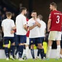 Norway's Kristoffer Ajer chats with former Celtic team-mates Ryan Christie and Greg Taylor at the end of the 3-3 draw with Scotland that brought a return to Hampden for the centre-back and stirred many memories of his days with the Scottish club. (Photo by Paul Devlin / SNS Group)