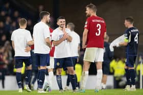 Norway's Kristoffer Ajer chats with former Celtic team-mates Ryan Christie and Greg Taylor at the end of the 3-3 draw with Scotland that brought a return to Hampden for the centre-back and stirred many memories of his days with the Scottish club. (Photo by Paul Devlin / SNS Group)