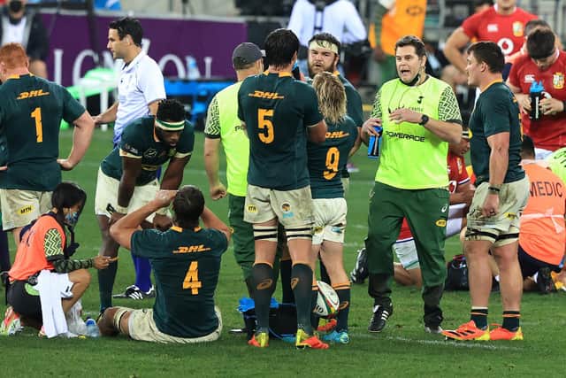 Rassie Erasmus, the Springboks director of rugby acting as a water carrier, talks to his team during the second Test against the Lions. Picture: David Rogers/Getty Images