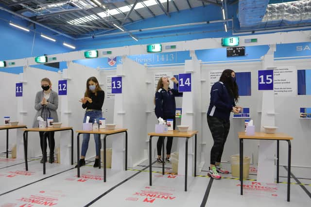 Students Anna-Ruth Cochrane, Emma Walsh, Fiona Waddell, Lily Wallace take a test.