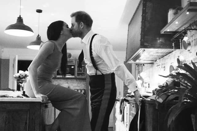 An image issued by Netflix of the Duke and Duchess of Sussex kissing in a kitchen. The picture is part of a trailer for a new documentary called "Harry and Meghan" - the Sussexes' behind the scenes. Picture: Duke and Duchess of Sussex/Netflix/PA Wire