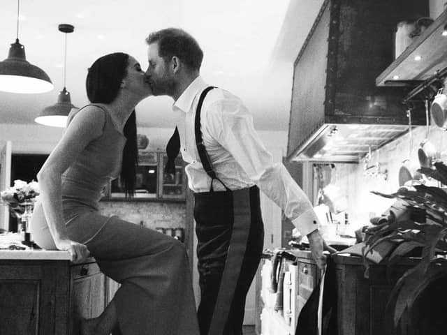 An image issued by Netflix of the Duke and Duchess of Sussex kissing in a kitchen. The picture is part of a trailer for a new documentary called "Harry and Meghan" - the Sussexes' behind the scenes. Picture: Duke and Duchess of Sussex/Netflix/PA Wire