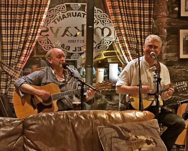 Pictured above is a folk concert taking place at McKays Hotel in Pitlochry; a town in the Scottish Highlands.