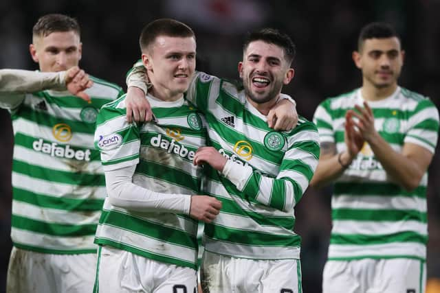 Celtic's Ben Doak and Greg Taylor (right) at full time.