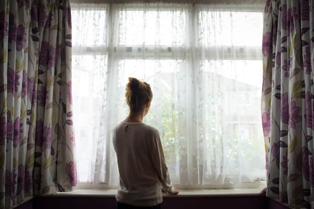This 23-year-old woman, a victim of modern slavery, was forced into prostitution around Europe before finding refuge in a safe house in the UK (Picture: Dominic Lipinski/PA Wire)