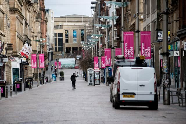 An almost empty Buchanan Street in the centre of Glasgow as people observe the spring 2020 lockdown. Non-essential stores were forced to close for months at the end of last year, hammering trade, but industry leaders had been hoping for a lift from April 26. Picture: John Devlin