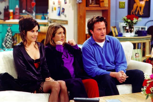 Courteney Cox, Jennifer Aniston and Matthew Perry on the set of Friends. Picture: Getty Images