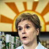 First Minister Nicola Sturgeon was challenged on potential delays to the Winter Heating Payment.