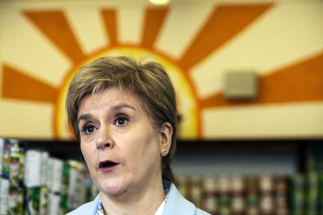 First Minister Nicola Sturgeon was challenged on potential delays to the Winter Heating Payment.
