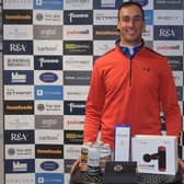 Ollie Roberts shows off his prizes after winning the Tartan Pro Tour's Carnoustie Tour Championship sponsored by Angus Soft Fruits. Picture: Tartan Pro Tour