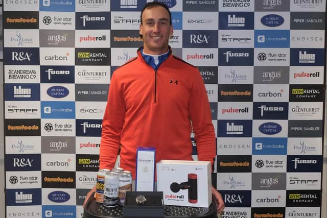 Ollie Roberts shows off his prizes after winning the Tartan Pro Tour's Carnoustie Tour Championship sponsored by Angus Soft Fruits. Picture: Tartan Pro Tour