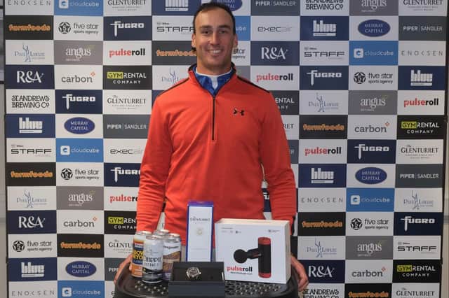 Ollie Roberts shows off his prizes after winning the Tartan Pro Tour's Carnoustie Tour Championship sponsored by Angus Soft Fruits. Picture: Tartan Pro Tour
