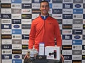 Ollie Roberts shows off his prizes after winning the Tartan Pro Tour's Carnoustie Tour Championship sponsored by Angus Soft Fruits. Picture: Tartan Pro Tour