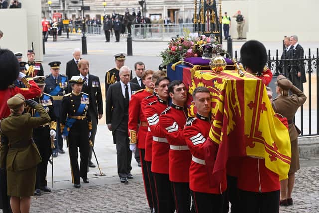 Members of the Royal Family walk behind the coffin of Queen Elizabeth II outside Westminster Abbey (Picture: Geoff Pugh/pool via AP)