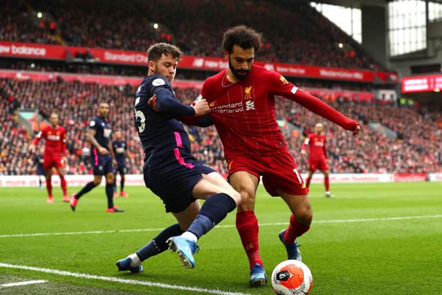 Jack Simpson of AFC Bournemouth battles for possession with Mohamed Salah of Liverpool during the Premier League match on March 07, 2020. (Photo by Jan Kruger/Getty Images)