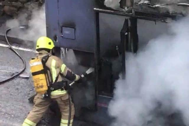 A firefighter tackling the August 2018 blaze near Denny