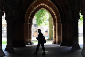 A student walks on campus at Glasgow University. Picture: Andy Buchanan/AFP via Getty Images