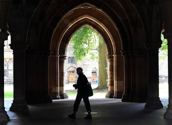 A student walks on campus at Glasgow University. Picture: Andy Buchanan/AFP via Getty Images