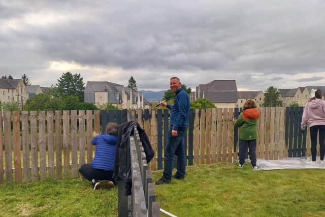 85th Greenock & District Scout Group volunteering with gardening work at HC-One Scotland’s Merino Court Care Home