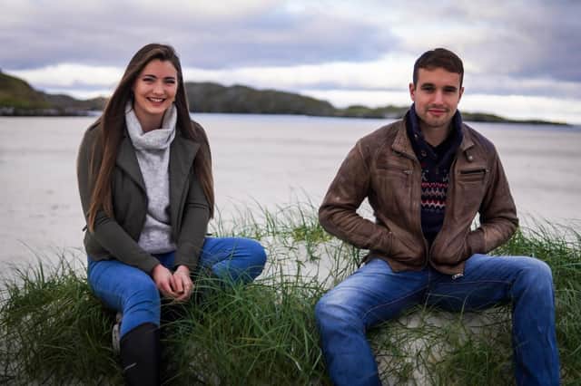 Kate Macleod, 24, pictured here with her brother Seumas, has spoken of her 'heartbreak' that she cannot buy a home in Uig, Lewis, where she was raised given it is a popular spot for tourists.