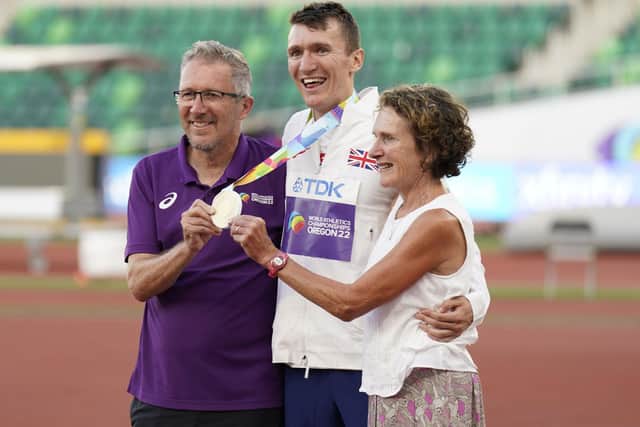 Geoff and Susan Wightman with their son Jake after he won gold in the men's 1500m final run at the World Athletics Championships, in Eugene, Oregon. Photo by Ashley Landis/AP/Shutterstock
