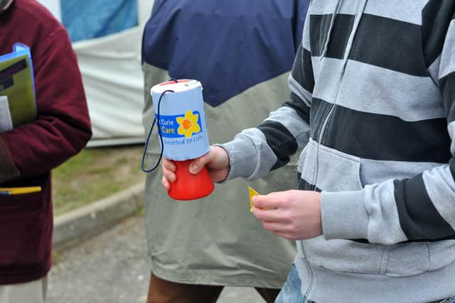 Charities face rising costs and falling donations as a result of high inflation and soaring energy prices (Picture: Clive Gee/PA)