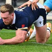 Scotland's full back Stuart Hogg grounds the ball over his own line under pressure from Italy's centre Federico Mori during the Autumn Nations Cup rugby union match on 14 November. (Pic: Getty Images)