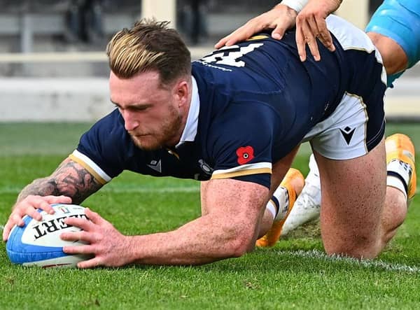 Scotland's full back Stuart Hogg grounds the ball over his own line under pressure from Italy's centre Federico Mori during the Autumn Nations Cup rugby union match on 14 November. (Pic: Getty Images)