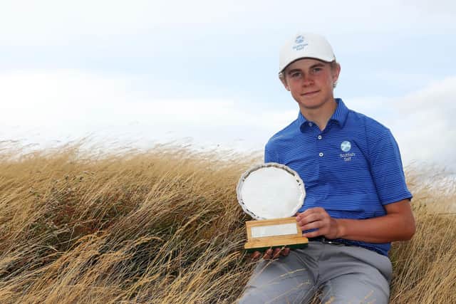 Connor Graham shows off the trophy after winning the the R&A Junior Open at Monifieth. Picture: Matthew Lewis/R&A/R&A via Getty Images.