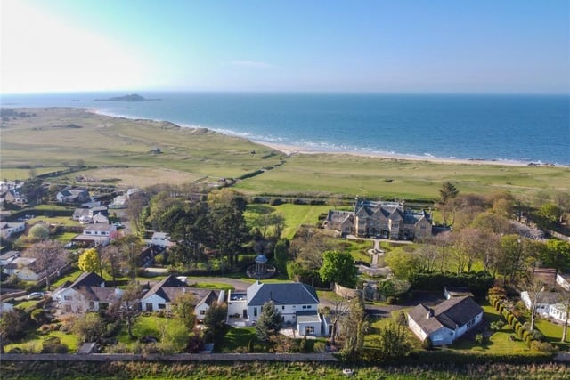 Aerial view of property and view to the coast.