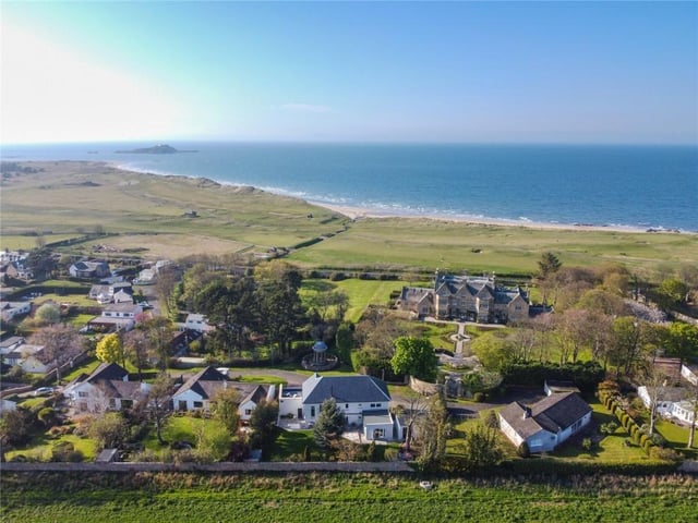Aerial view of property and view to the coast.