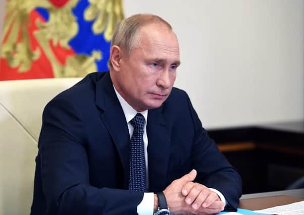Russian president Vladimir Putin attends a cabinet meeting at the Novo-Ogaryovo residence outside Moscow. Picture: Alexei Nikolsky, Sputnik, Kremlin Pool Photo via AP