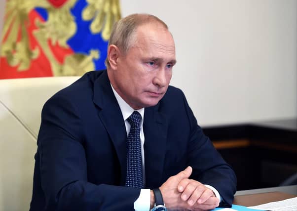 Russian president Vladimir Putin attends a cabinet meeting at the Novo-Ogaryovo residence outside Moscow. Picture: Alexei Nikolsky, Sputnik, Kremlin Pool Photo via AP