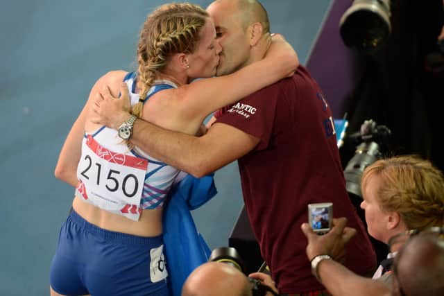 Eilidh Child shares a kiss with then fiancé, now husband, Brian Doyle after winning silver in Glasgow at the 2014 Commonwealth Games. Picture: Rob Casey/SNS
