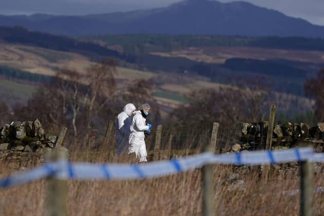Police at the scene in the Pitilie area on the outskirts of Aberfeldy, Photo: Andrew Milligan/PA Wire