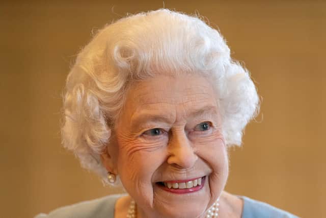 The Queen, photographed at Sandringham earlier this month, has tested positive for coronavirus and is experiencing "mild cold-like symptoms". Photo: Joe Giddens/PA Wire