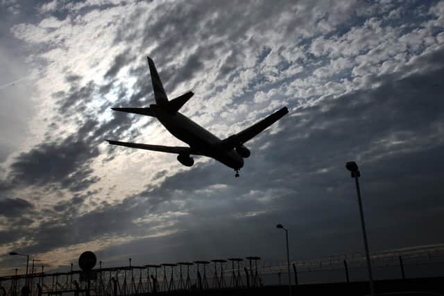 A plane comes into land. There have been thousands of 'ghost' flights into and out of Scottish airports over the past four years. Picture: Matt Cardy/Getty Images