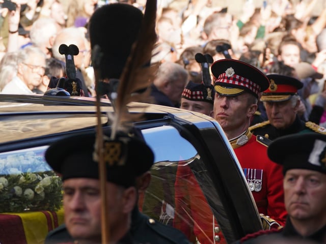 King Charles III and members of the royal family join the procession of Queen Elizabeth's coffin from the Palace of Holyroodhouse to St Giles' Cathedral, Edinburgh