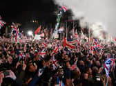 Brexit supporters wave Union flags on the day the UK formally left the European Union (Picture: Daniel Leal-Olivas/AFP via Getty Images)