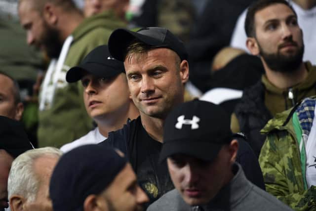 Former Celtic goalkeeper Artur Boruc (centre) joins the Legia Warsaw fans during the Europa League play off second leg between Rangers and Legia Warsaw at Ibrox in 2019.