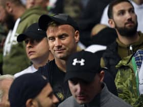 Former Celtic goalkeeper Artur Boruc (centre) joins the Legia Warsaw fans during the Europa League play off second leg between Rangers and Legia Warsaw at Ibrox in 2019.