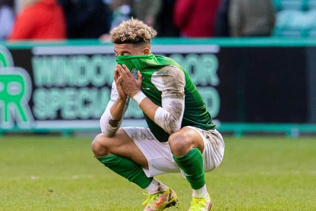 Hibs' Sylvester Jasper despairs at full-time. (Photo by Ross Parker / SNS Group)