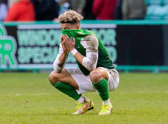 Hibs' Sylvester Jasper despairs at full-time. (Photo by Ross Parker / SNS Group)