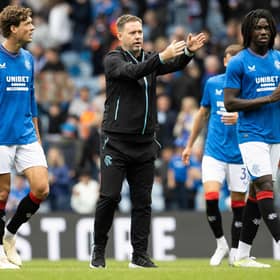 Rangers manager Michael Beale speaks with Sam Lammers and Johnly Yfeko during the 2-1 win over Hamburg.